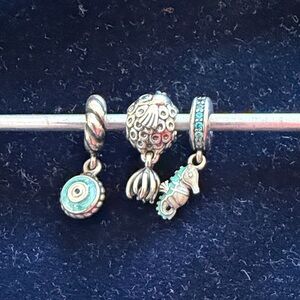 Trio of vintage Pandora charms